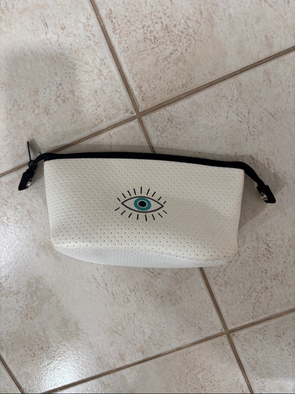 White Perforated Cosmetic Pouch with Eye Motif